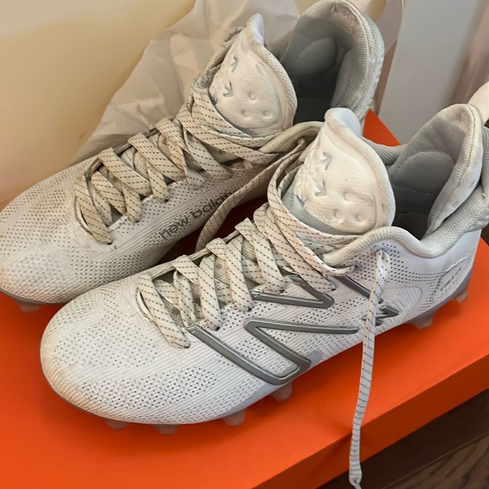 New balance clears worn twice for lacrosse